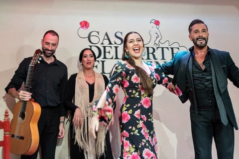 Happy flamenco group after a performance, joy and satisfaction in expression, Granada