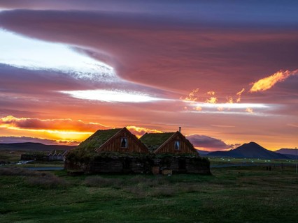 Sunset at Mödrudalur farm and guesthouse, church, dramatic cloud formation, northwest of