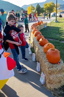 Lakewood, Colorado, Families enjoy the pre-Halloween Haunted Trail event at Bear Creek Lake Park.