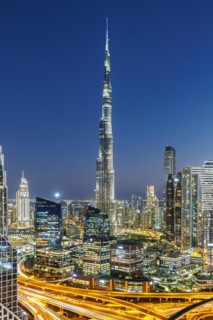 Burj Khalifa skyline tallest building in the world from above in Downtown at night in Dubai, United
