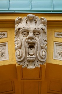Grotesque above the left entrance portal of the Luitpold Primary School, built in 1901 in Art