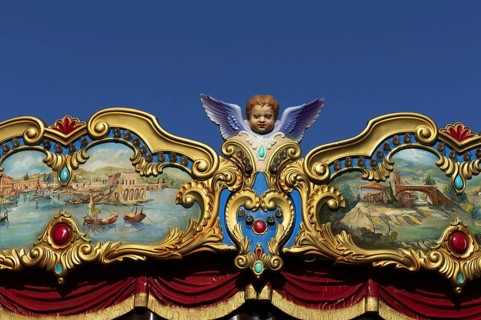Deatil of an angel on a historical carousel, Rome, Italy, Europe