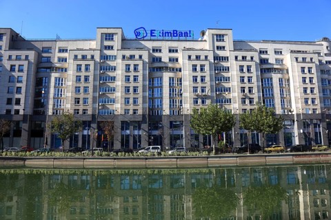 Apartment blocks and office buildings, bank building on the Dambovita River, Bucharest, Romania,