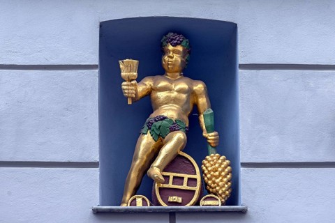 Bacchus figure in a niche of a residential building, Wismar, Mecklenberg-Western Pomerania,