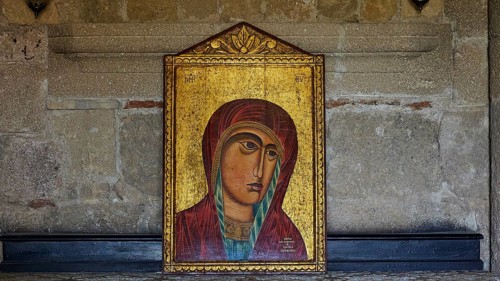 Icon of the Mother of God, close-up of a religious icon, Mary with baby Jesus, on a golden