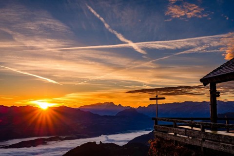 Sunrise at the Toni-Lenz-Hütte, behind Osterhorngruppe, Dachstein and Tennengebirge, in the valley