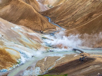 Steaming hot springs and colourful rhyolite mountains, hiking path, Hveradalir geothermal area,