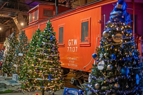 St. Thomas, Ontario Canada - Decorated Christmas trees and historic railway rolling stock are on