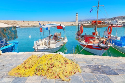 Fishing boat moored at Venetian harbour, Rethymno, Crete, Greece, Europe