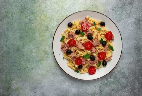 Tuna salad, fusilli pasta, olives and cherry, olive oil, homemade