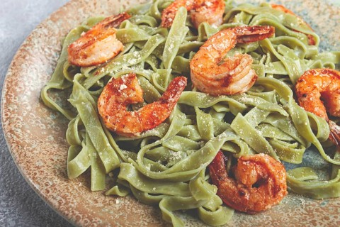 Tagliatelle with spinach, in cream sauce, with shrimp, homemade, no people