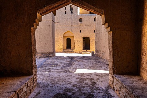 Narrow passageway in the largest preserved mud town in Oman, Al Bilaad, Al Bilaad Historical
