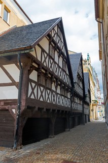 Narrow half-timbered house in a cobblestone alley, rustic atmosphere, Wallenstein houses, Liberec,
