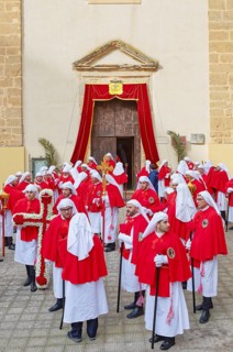 Confraternity of penitents gathering outside San Leonardo church, Enna, Siclly, Italy, Europe