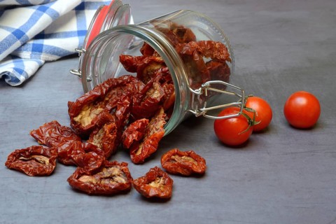Dried tomatoes in glass containers, Solanum lycopersicum