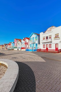 Brightly painted beach homes, Costa Nova do Prado, Aveiro, Portugal, Europe