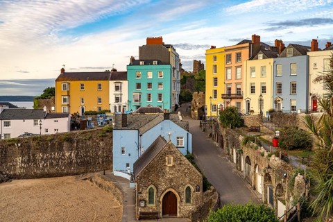 St Julian's Chapel and the colourful houses of Tenby, Wales, Great Britain