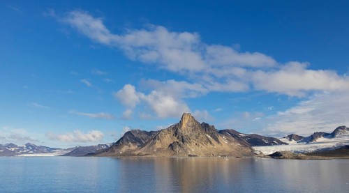 Mountain with steep sea cliffs in Hornsund fjord in summer, Svalbard, Spitsbergen, Norway, Europe