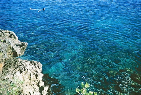 Snorkelling in the sea above a coral reef in Ocho Rios, Jamaica, 1970, Central America