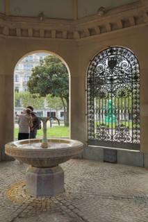 Interior view of the pavilion with Kochbrunnen at Kochbrunnenplatz, metal grid, persons, two,