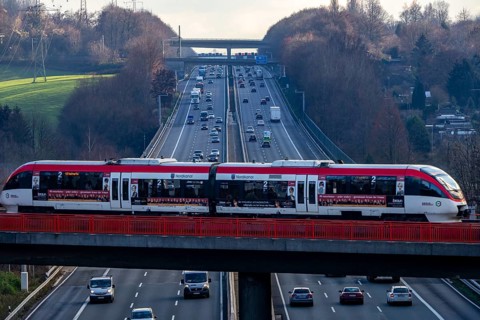 A3 motorway between Düsseldorf and Leverkusen, near Erkrath, railway bridge, Regio train