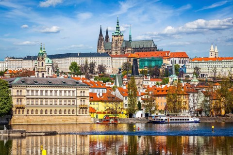View of and Gradchany Prague Castle and St. Vitus Cathedral over Vltava river