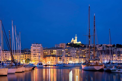 Marseille Old Port (Vieux-Port de Marseille) with yachts and Basilica of Notre-Dame de la Garde in