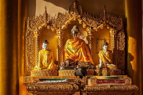 Buddha statues in Burma famous sacred place and tourist attraction landmark, Shwedagon Paya pagoda.