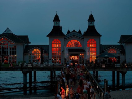 Illuminated pier Sellin, crowd at dusk, view from above, Baltic Sea resort Sellin, Rügen Island,