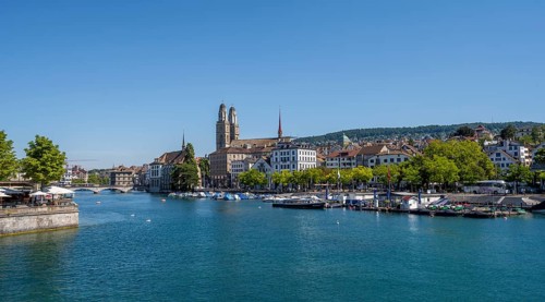 View from the Quai Bridge over the Limmat to the towers of Zurich's Old Town, Zurich, Switzerland,