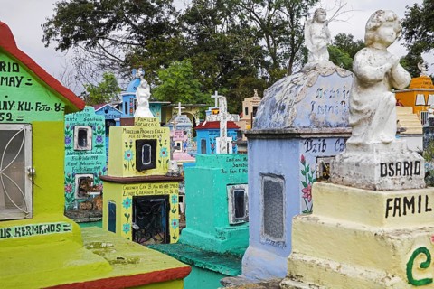 Colourful memorials, gravestones and tombstones at Hoctún Cemetery near Mérida, Yucatán, Mexico,