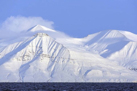 Snow covered mountains at Billefjorden, central fjord of the Isfjorden, Svalbard, Spitsbergen,