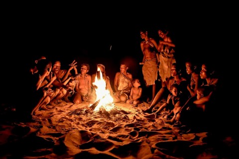 Bushmen of the Ju/' Hoansi-San sitting at the campfire, village //Xa/oba, near Tsumkwe,