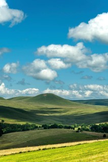View of the Chamaroux mountain near the village of Montgreleix, Cezallier massif, Auvergne