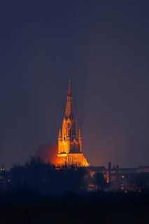 Illuminated cathedral in the Hanseatic town of Demmin on the River Peene, Peene Valley River