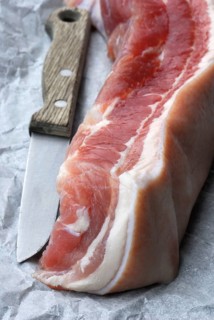 Salted bacon, pork bacon, cured bacon, knife