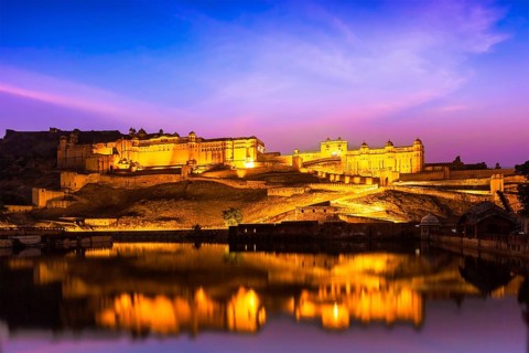 Indian landmark, Amer Fort (Amber Fort) illuminated at night, one of principal attractions in
