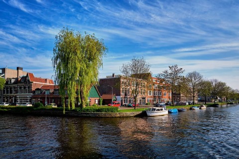 Boats and houses and canal. Harlem, Netherlands