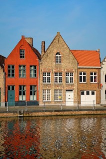 Typical Belgian cityscape Europe tourism concept, canal and old houses on sunset. Bruges (Brugge),