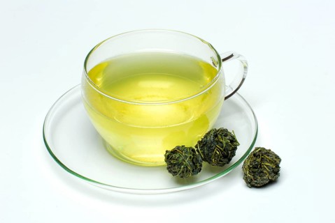 Cup of Jiao-gu-lan tea, dried balls, female ginseng (Gynostemma pentaphyllum) , Jiao-gu-lan