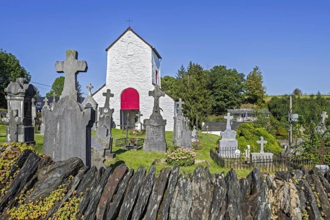 12th century Chapelle Saint-Marguerite and cemetery in the village Ollomont, Houffalize, province
