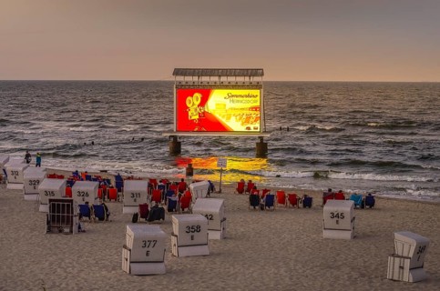Summer cinema on the beach, screen, LED projection in the sea, Baltic Sea, Heringsdorf, Usedom,