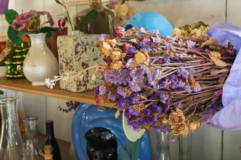 Dried flowers and curios for sale inside second hand goods and chattels store, Quebec, Canada,