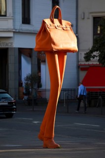 The bronze sculpture Walking Bag by Erwin Wurms at the entrance of the urban shopping zone, Bonn,