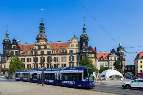 Modern DVB tram in Dresden city centre, Dophienstrasse at the Residence Palace