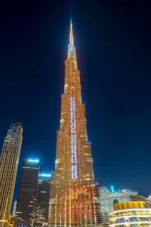 Night shot, illuminated advertising at the Burj Khalifa, Downtown, Dubai, United Arab Emirates,
