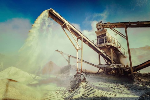 Vintage retro effect filtered hipster style image of Industrial background, crusher rock stone