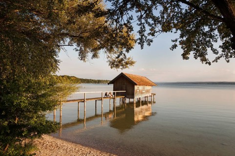 Boathouse with jetty, summer light, Herrsching am Lake Ammer, Bavaria, Germany, Europe