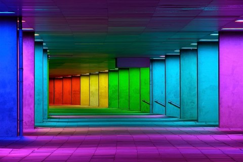 Colorful mulitcolord illuminated gallery tunnel rainbow passage under NAI building, Nederlands