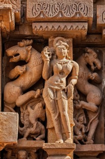 Famous erotic stone carving sculptures, Lakshmana Temple, Khajuraho, India. Unesco World Heritage
